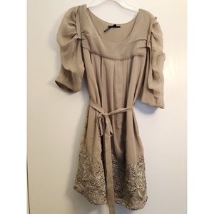 Super cute dress with flower detail and belt!